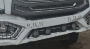 NX TRACTOR - DAMAGED DOORS AND BUMPER