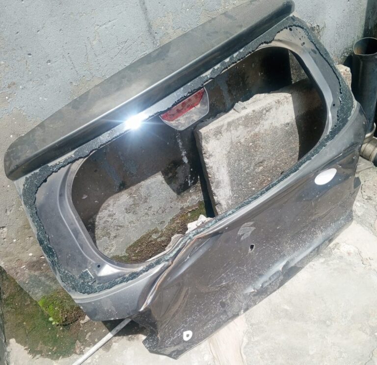 DAMAGED SUZUKI DOOR